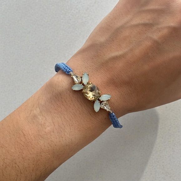 Juicy Couture Jewelry - Blue and Yellow Juicy Couture rhinestone bracelet